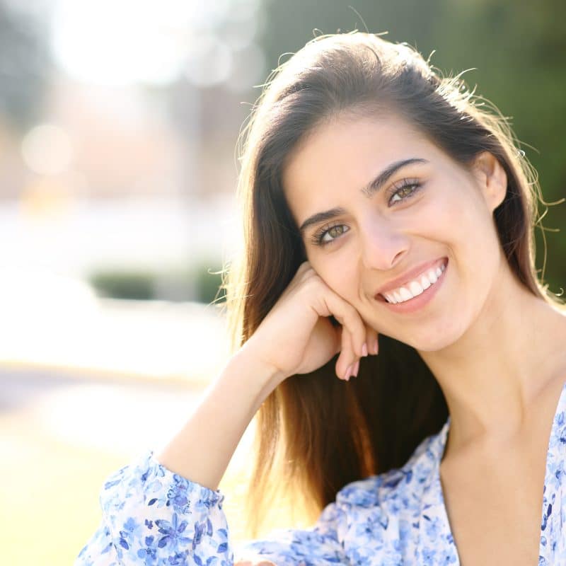 Patient smiling before her dentist appointment in Winston-Salem